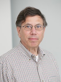 A headshot of Tom Friedman, Ph.D.