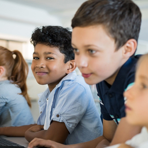 Children using a computer in school